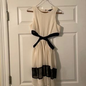 Cream and black occasional dress. Very sexy